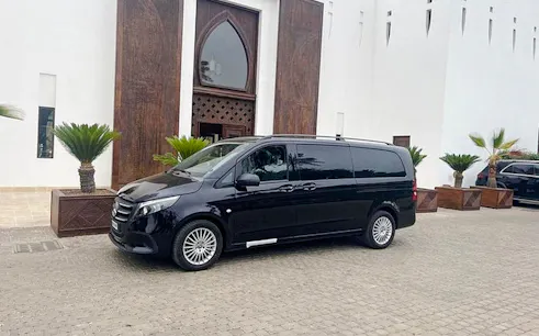 Private transfer van parked outside a hotel in Agadir, Morocco.