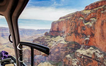 Helicopter view of Grand Canyon West cliffs and landscape.