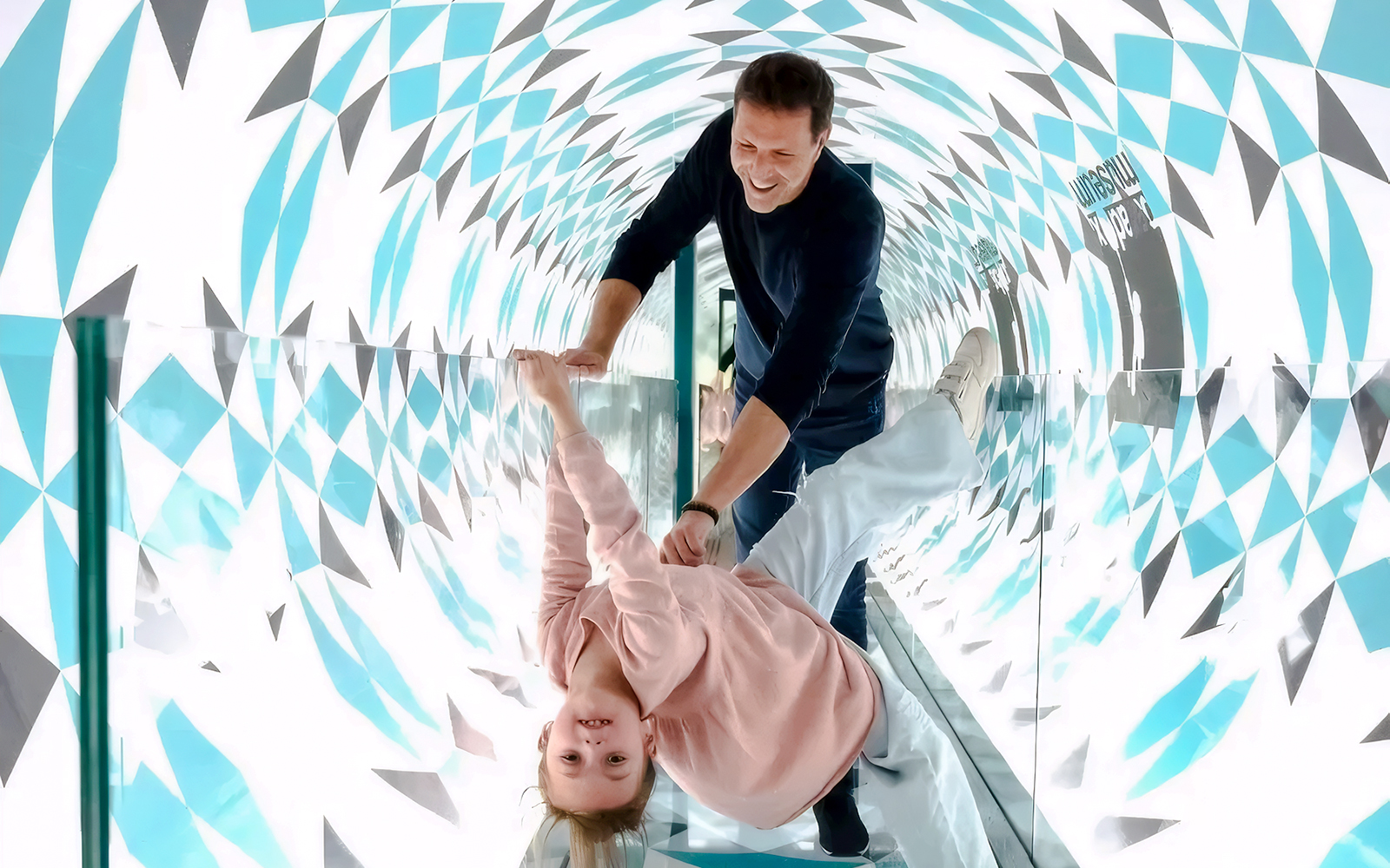 Visitors enjoying the Paradox Tunnel at Paradox Museum Paris.