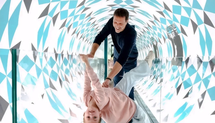 Visitors enjoying the Paradox Tunnel at Paradox Museum Paris.