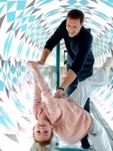 Visitors enjoying the Paradox Tunnel at Paradox Museum Paris.