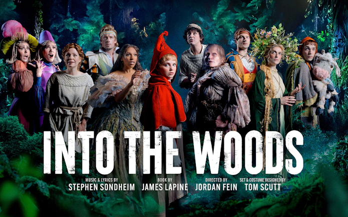Cast of "Into the Woods" in costume on stage, Westend production.