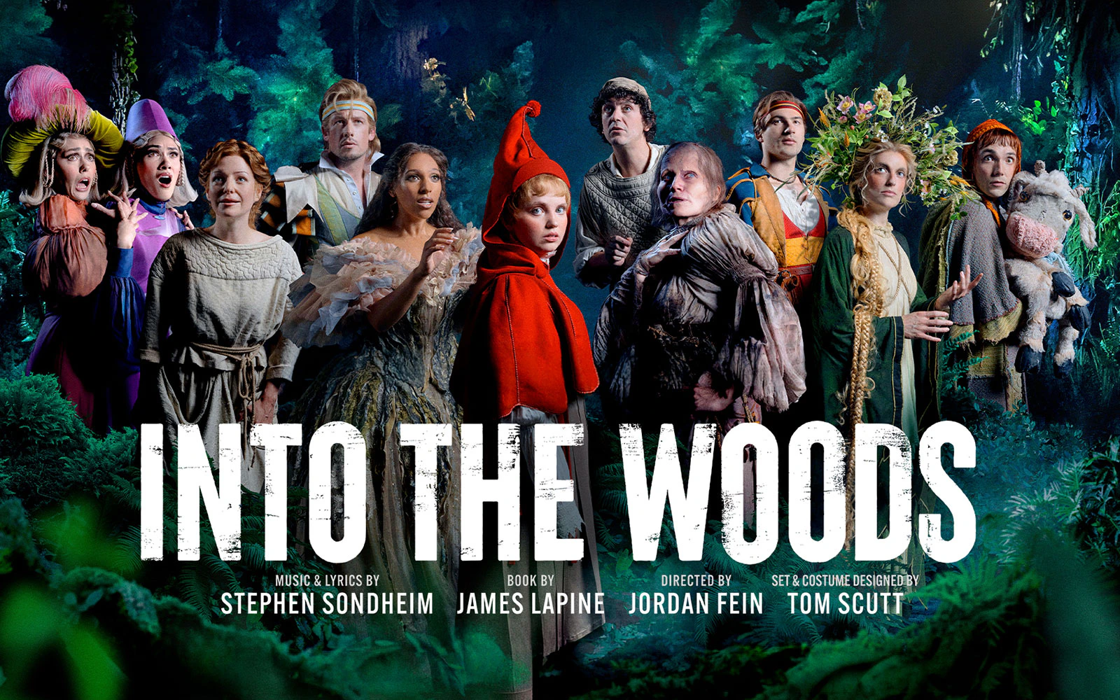 Cast of "Into the Woods" in costume on stage, Westend production.