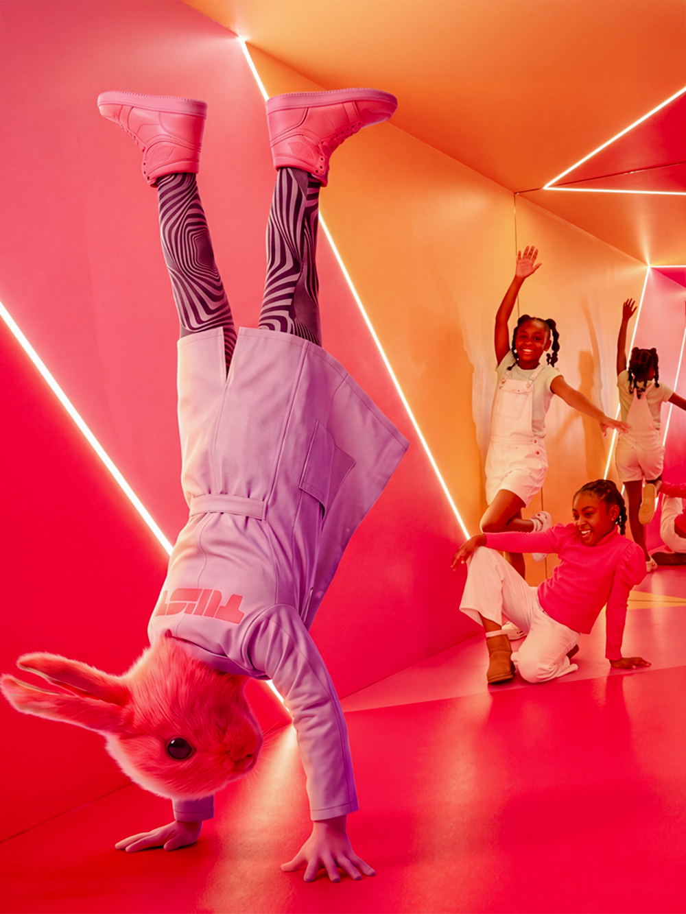 Guests interacting with colorful installations at the Twist Museum in London.