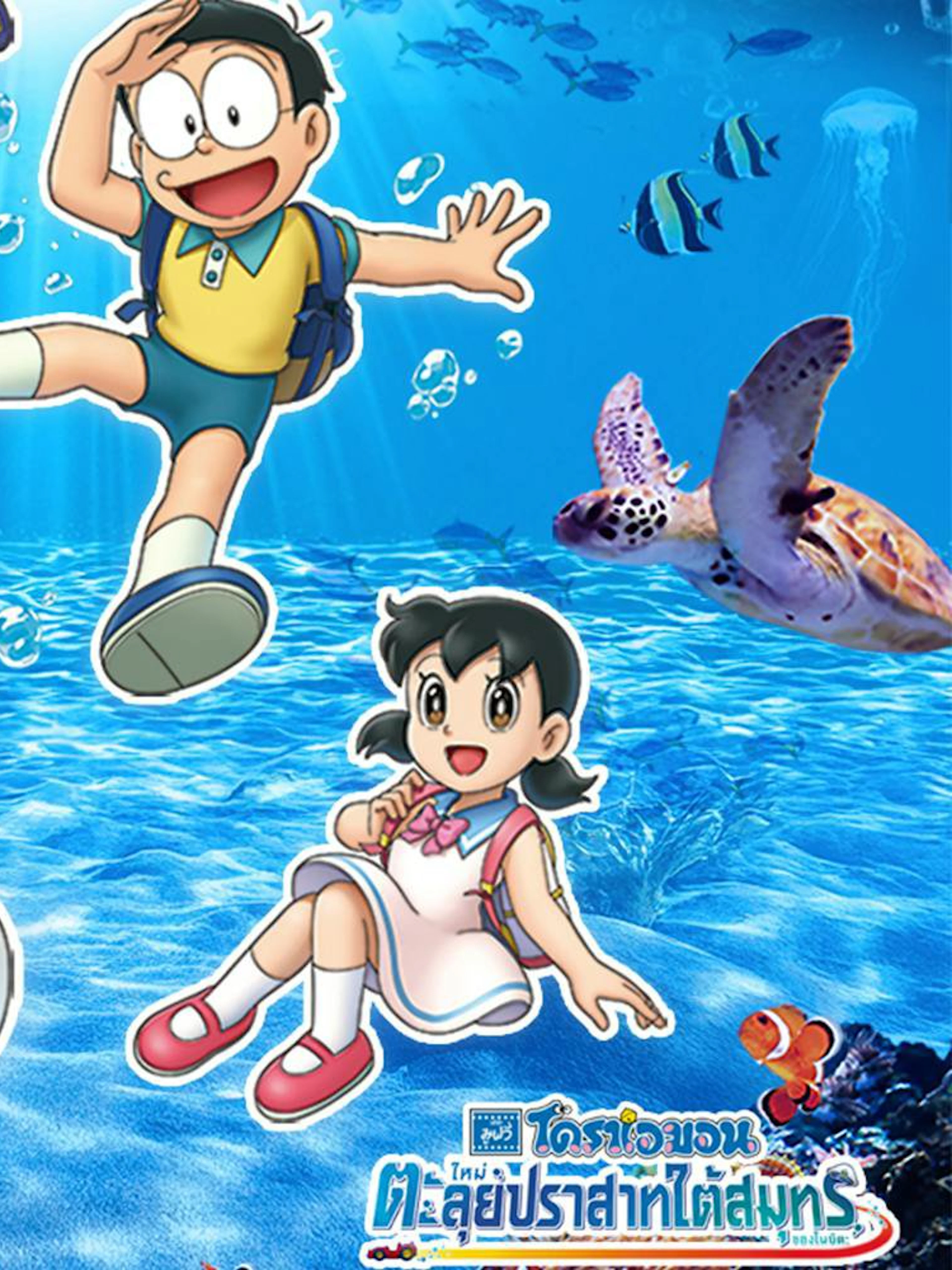 Doraemon characters exploring underwater at SEA LIFE Bangkok with marine animals.