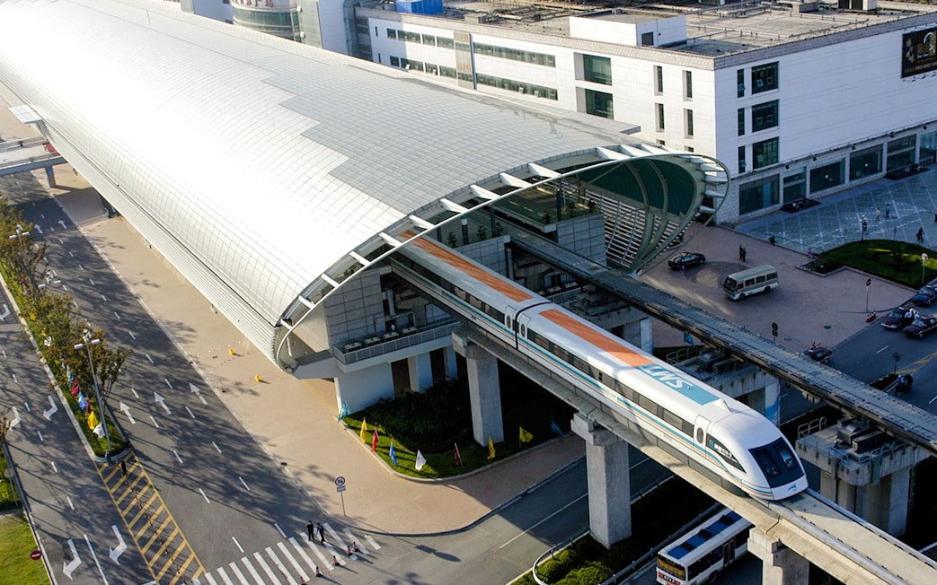 Shanghai Maglev Train departing from a modern station in Shanghai, China.