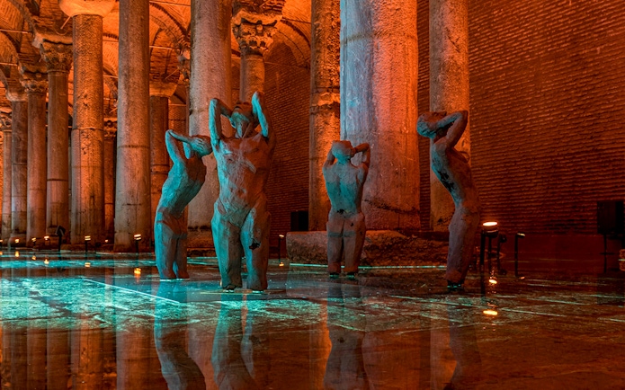 Basilica Cistern interior with illuminated columns and statues, Istanbul tour.