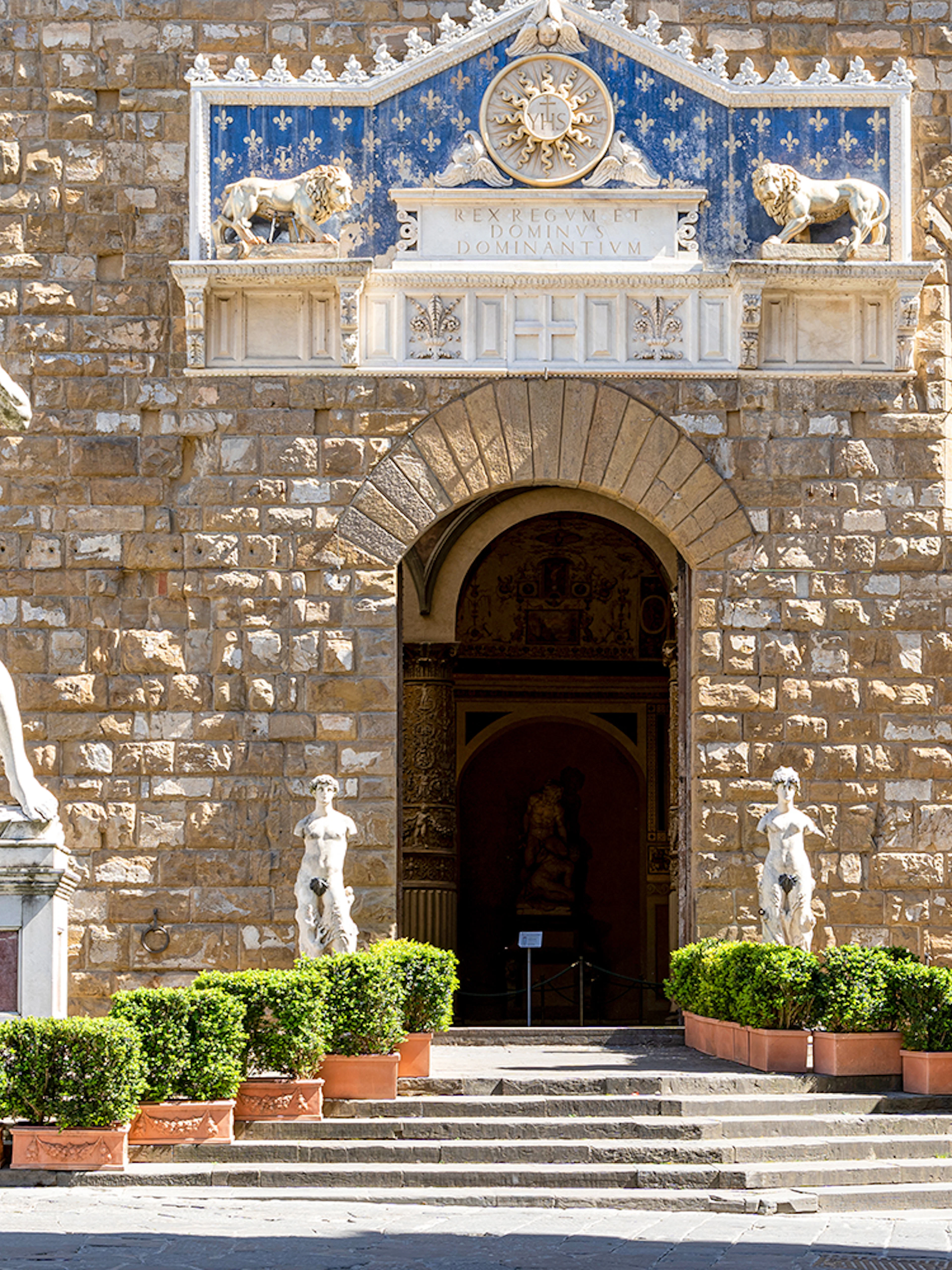 David and Michelangelo sculptures at Palazzo Vecchio Museum entrance, Florence.