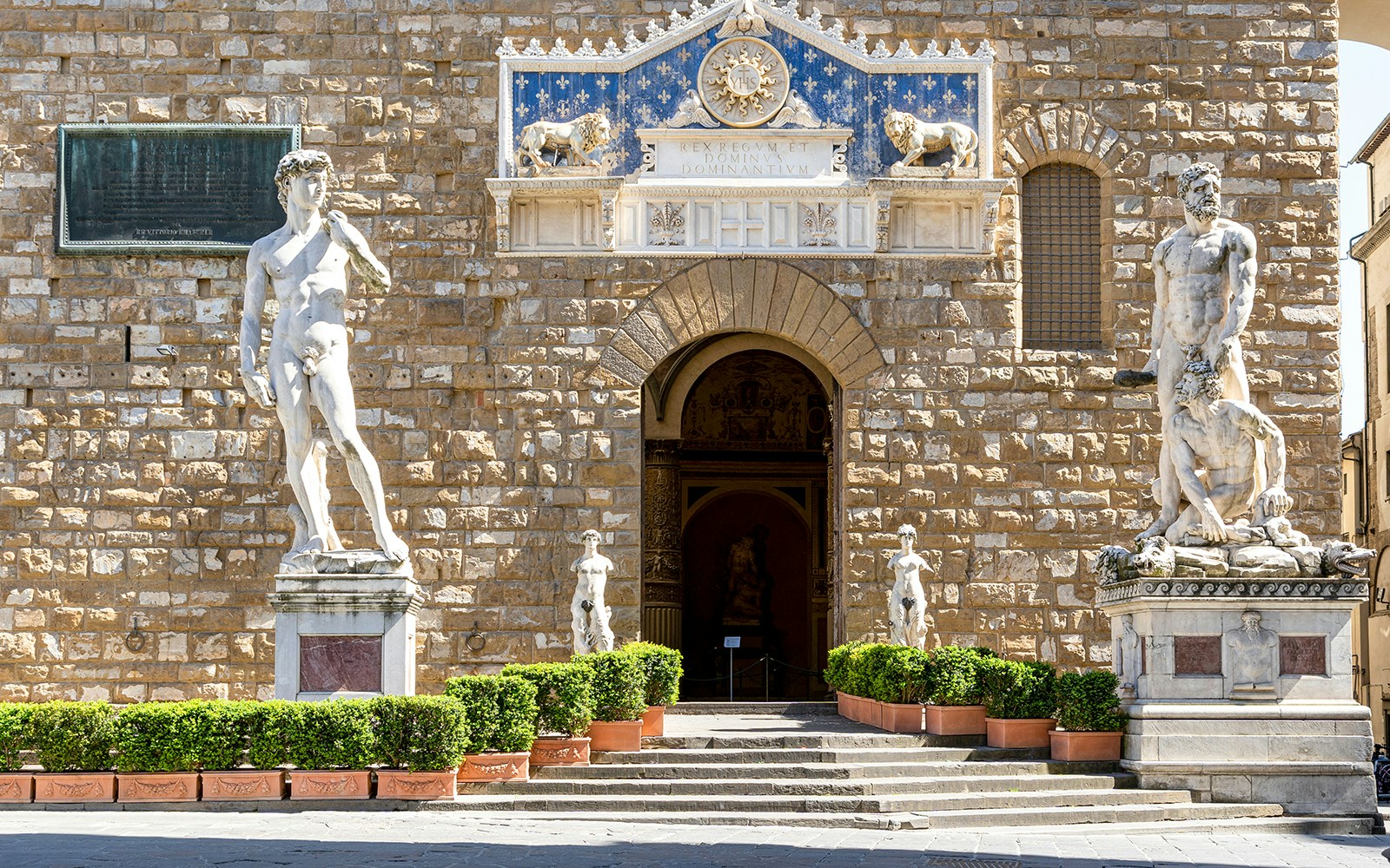 David and Michelangelo sculptures at Palazzo Vecchio Museum entrance, Florence.