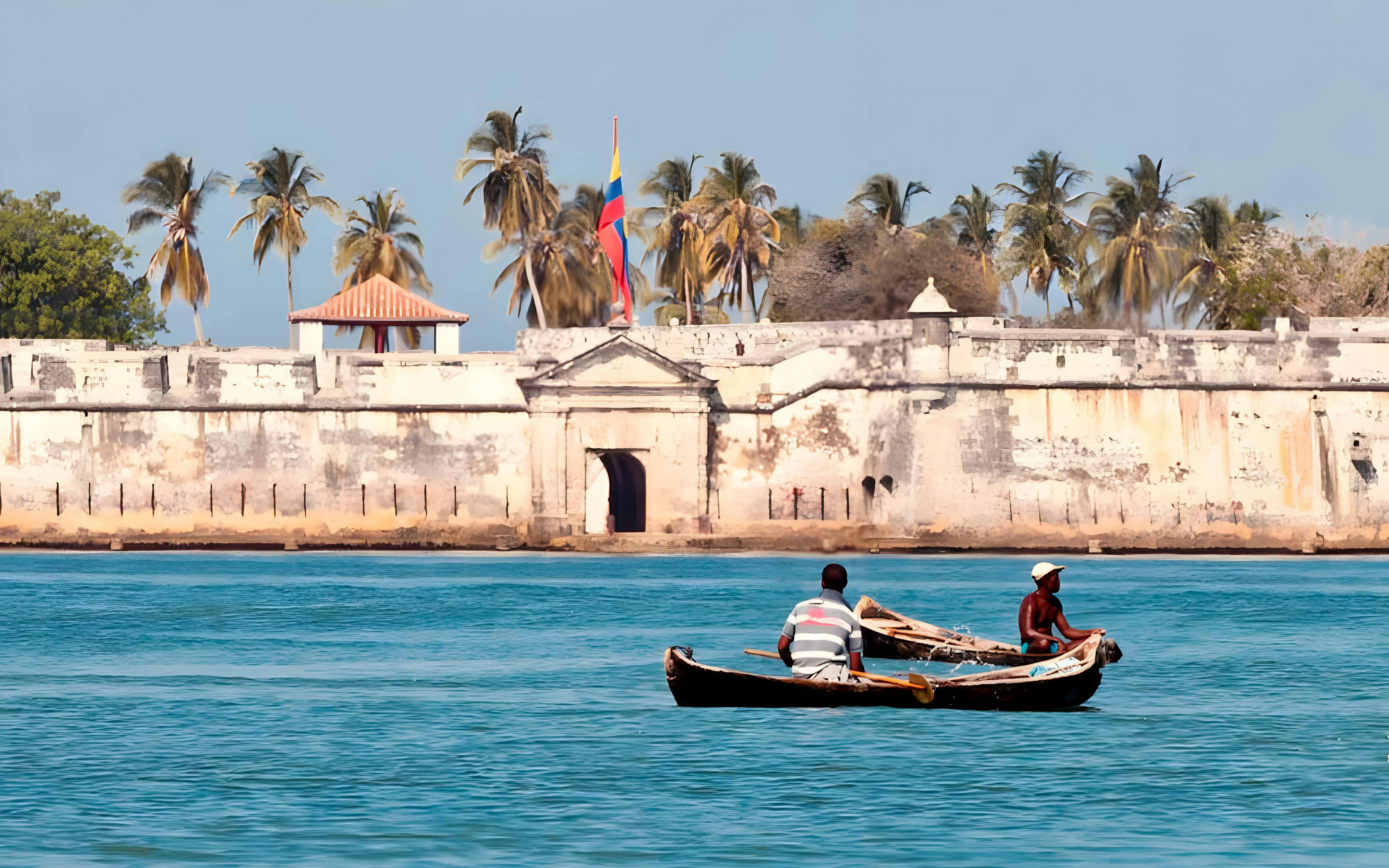 Two people in a boat near Fuerte de San Fernando, Bocachica, Isla Tierra Bomba, Colombia.