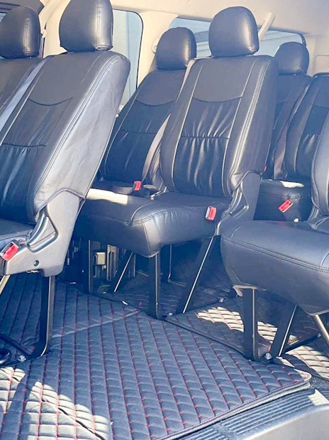 Spacious interior of a private transfer van for Tokyo Disney Resort.