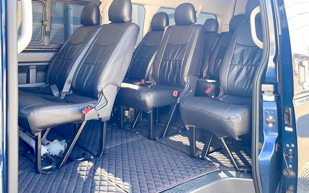 Spacious interior of a private transfer van for Tokyo Disney Resort.