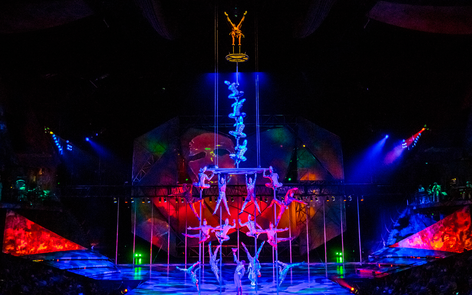 Acrobats performing a high-flying act in Mystère show, Las Vegas.