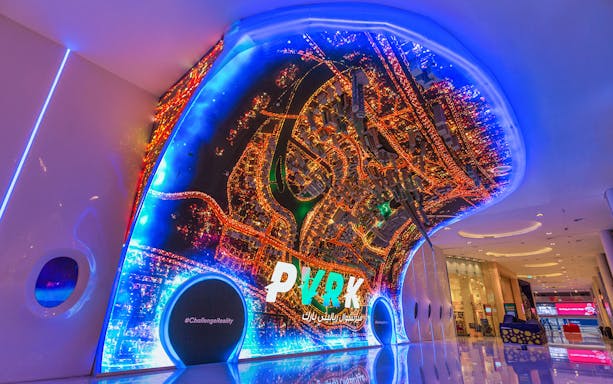 VR Park entrance with illuminated cityscape display, Dubai Mall, near Burj Khalifa.