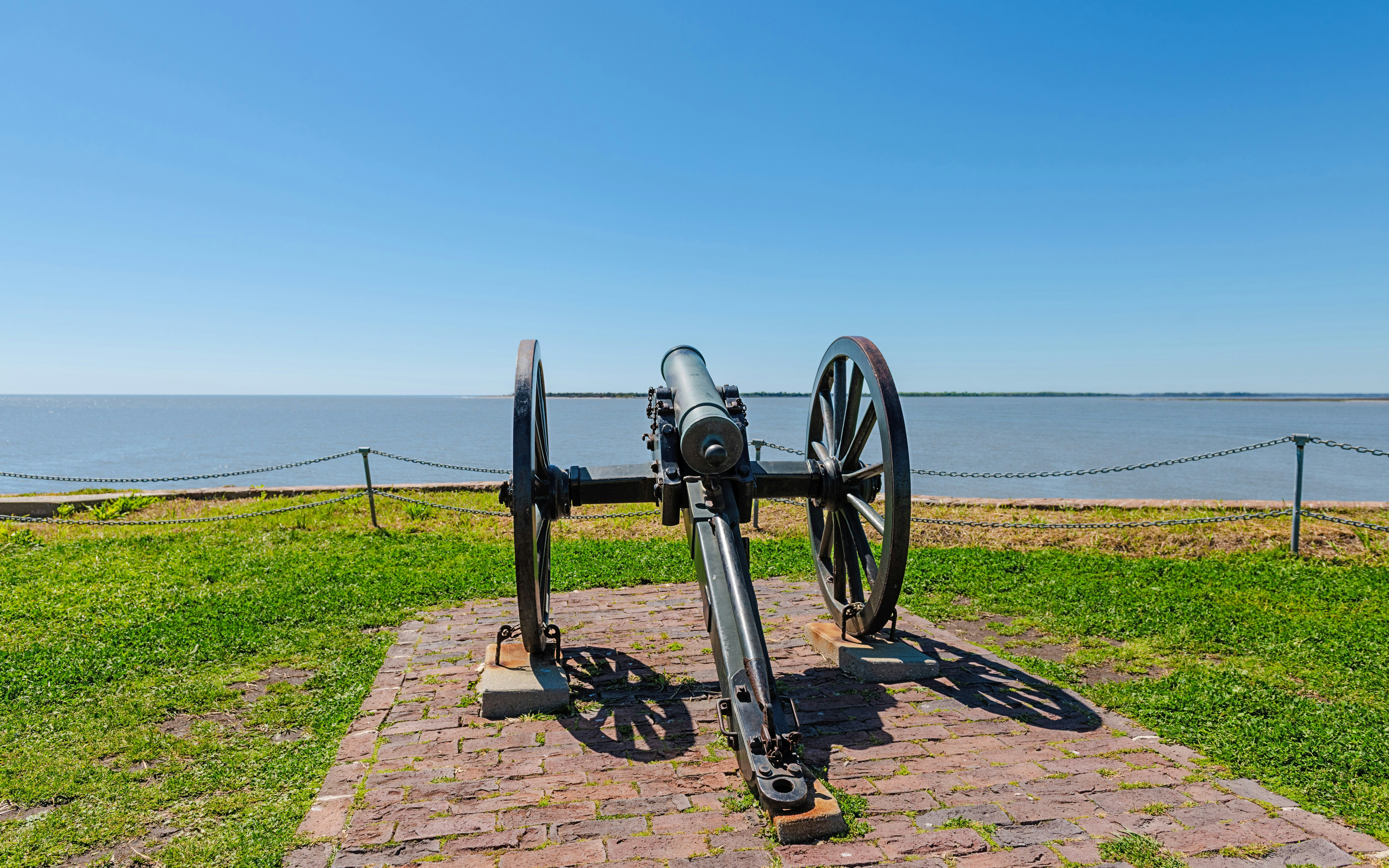 Civil War field cannon on wheels overlooking Charleston Harbor.