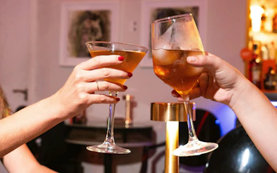 Cheers with cocktails at Teatro Flamenco Sevilla.
