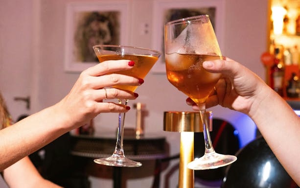Cheers with cocktails at Teatro Flamenco Sevilla.