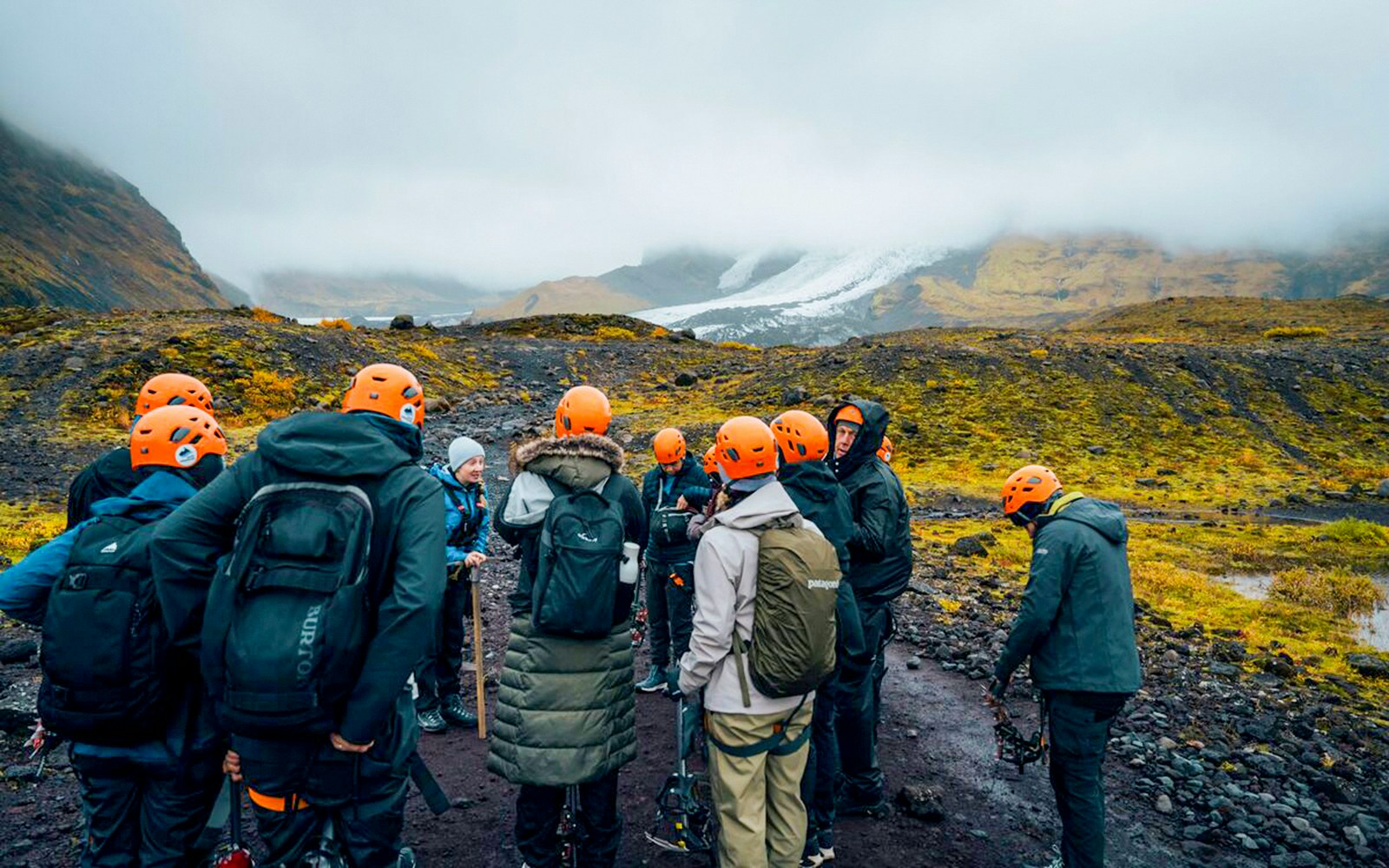 Tour guide briefing guests on Blue Ice Cave & Glacier Hike, Vatnajökull, Skaftafell.