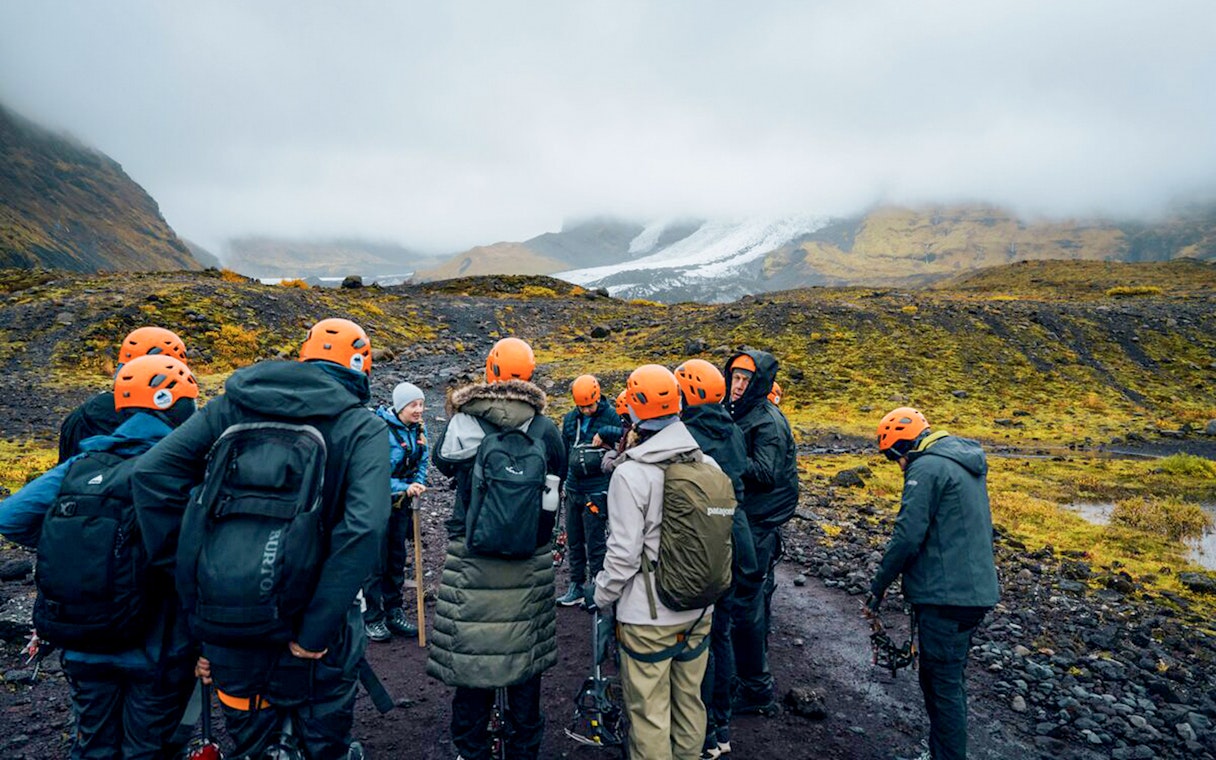 Tour guide briefing guests on Blue Ice Cave & Glacier Hike, Vatnajökull, Skaftafell.