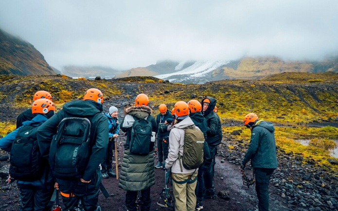 Tour guide briefing guests on Blue Ice Cave & Glacier Hike, Vatnajökull, Skaftafell.
