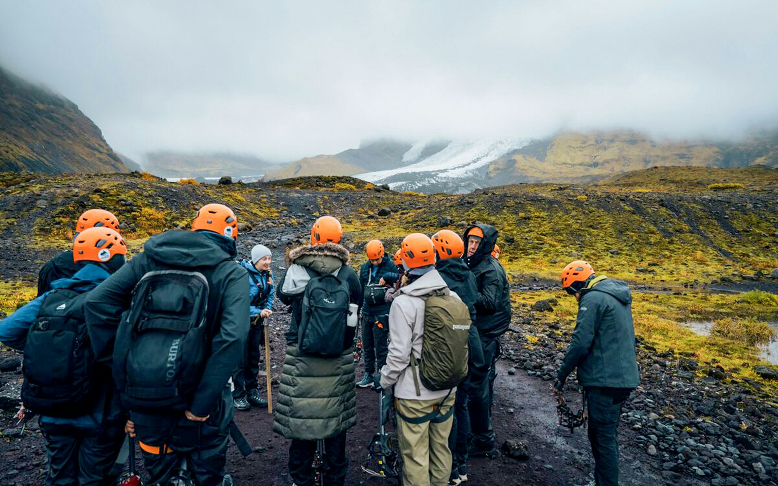 Tour guide briefing guests on Blue Ice Cave & Glacier Hike, Vatnajökull, Skaftafell.