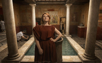 Ancient Roman bath scene with people in period clothing, part of Setas de Sevilla tour.