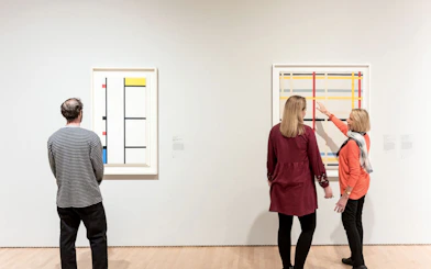 Visitors viewing abstract art at San Francisco Museum of Modern Art.