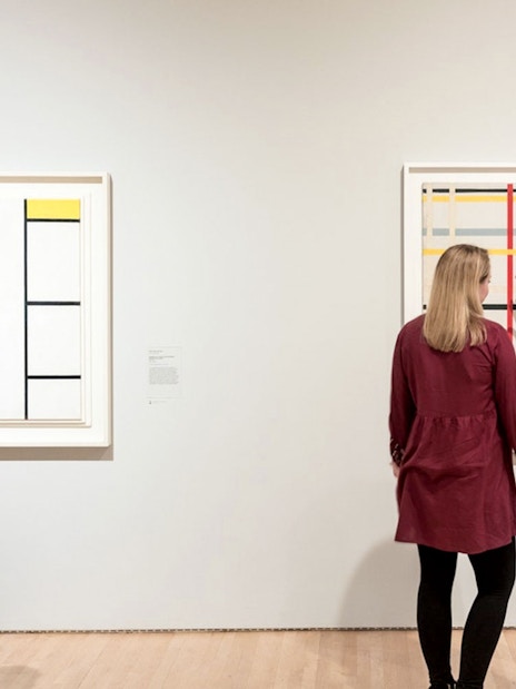 Visitors viewing abstract art at San Francisco Museum of Modern Art.