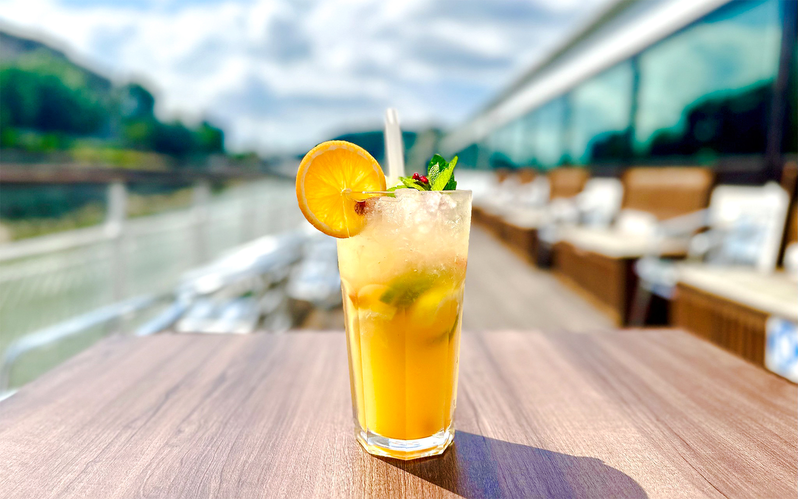 Cocktail with orange slice on Sunshine Booze Cruise, Budapest.