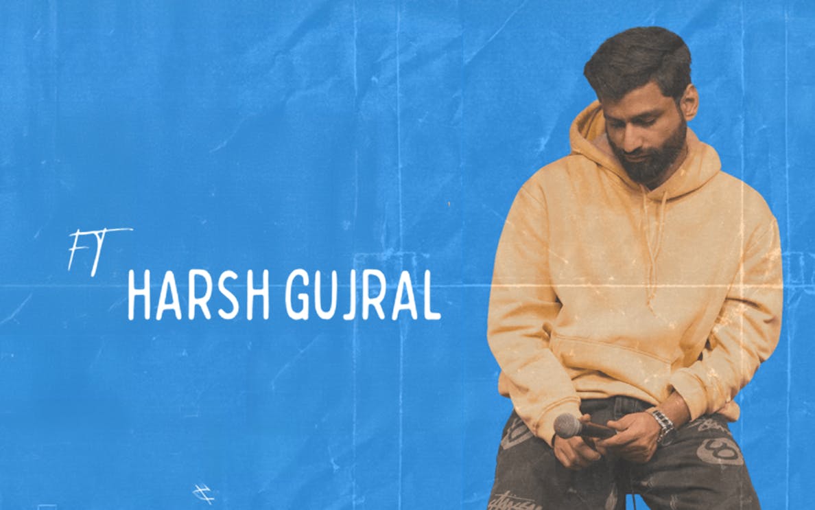 Stand-up comedian holding a microphone, featuring Harsh Gujral.