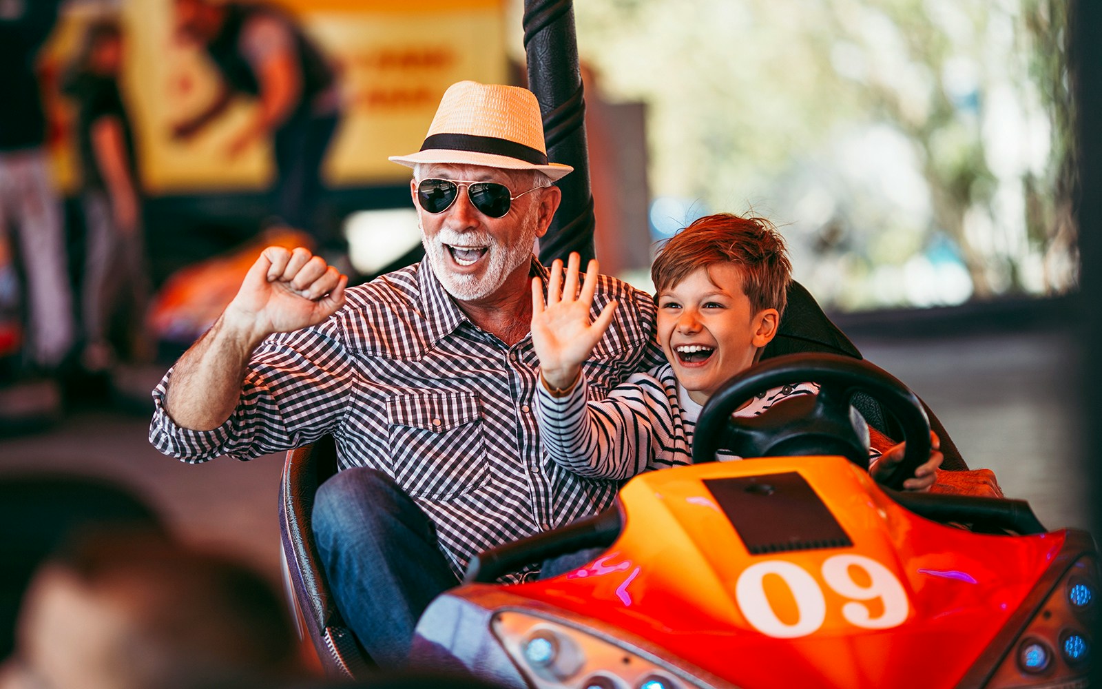 Bumper cars at an amusement park in Vienna, Austria, with people enjoying the ride.