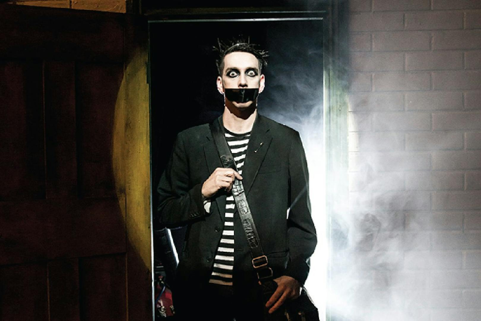 Performer with taped mouth in Tape Face show, Las Vegas.