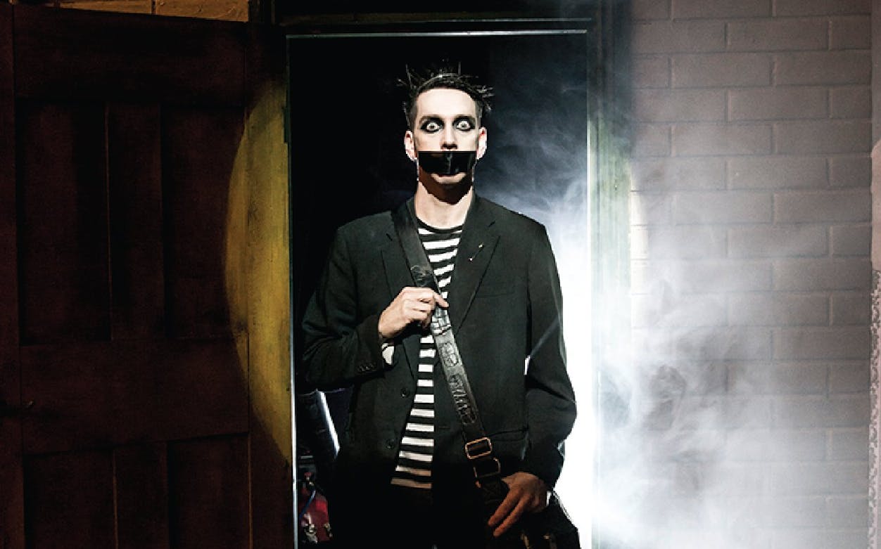 Performer with taped mouth in Tape Face show, Las Vegas.