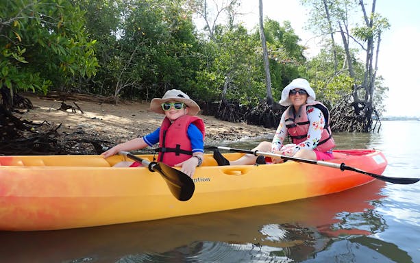 Kayaking through mangrove forest in Pulau Ubin, Singapore.