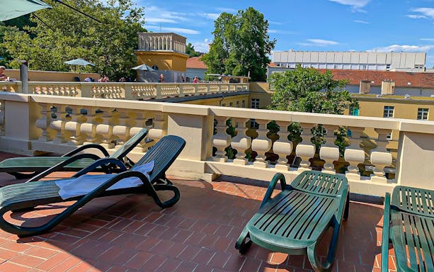 Sun beds on terrace at Lukacs Thermal Bath, Budapest.