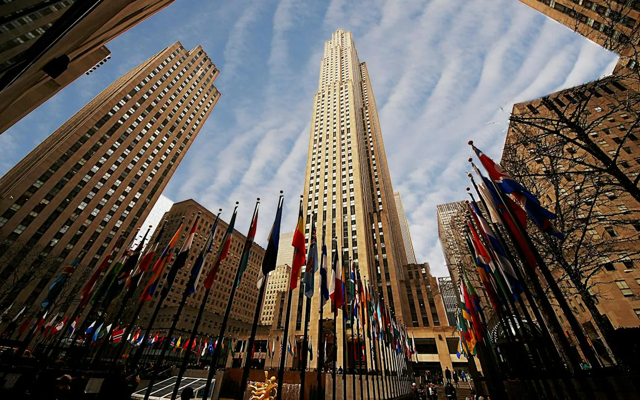Rockefeller Center with international flags, part of Secret Societies of Manhattan tour, New York.