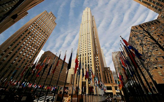 Rockefeller Center with international flags, part of Secret Societies of Manhattan tour, New York.