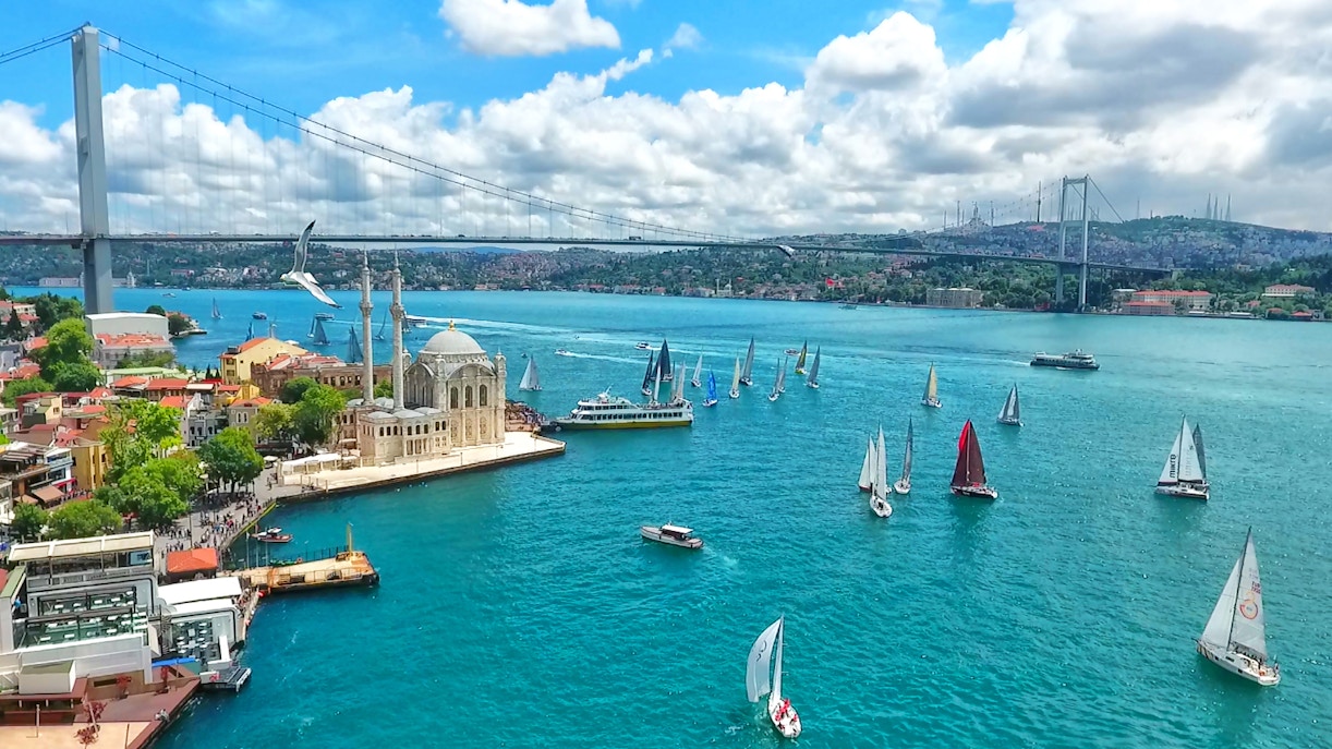 Maiden Tower and Bosphorus Bridge view from a cruise in Istanbul.