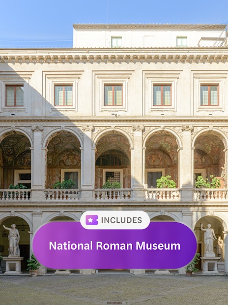 National Roman Museum courtyard with classical statues and arches.