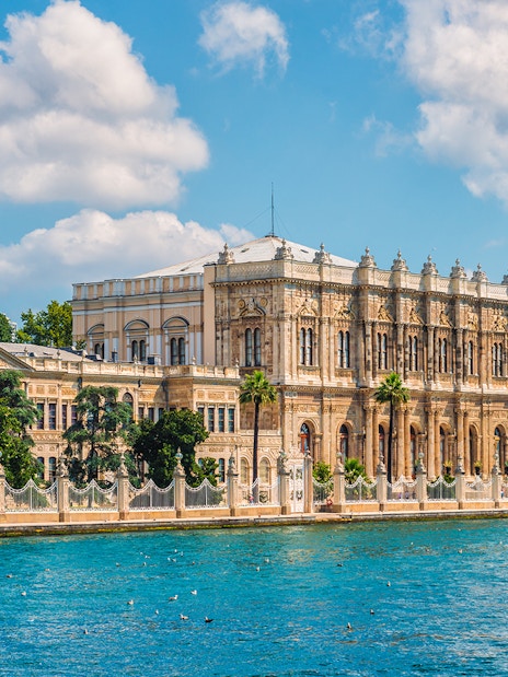 Dolmabahce Palace facade along the Bosphorus in Istanbul, Turkey.
