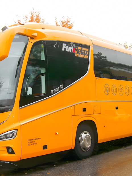 RegioJet bus parked on a street in Prague.