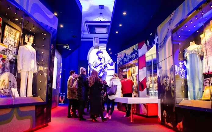Visitors exploring exhibits at the British Music Experience in Liverpool.