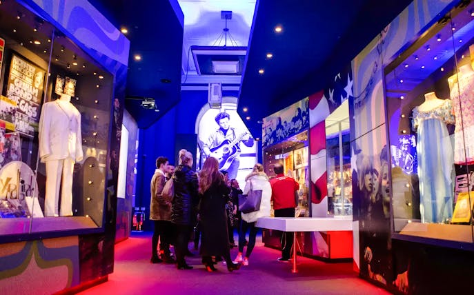 Visitors exploring exhibits at the British Music Experience in Liverpool.