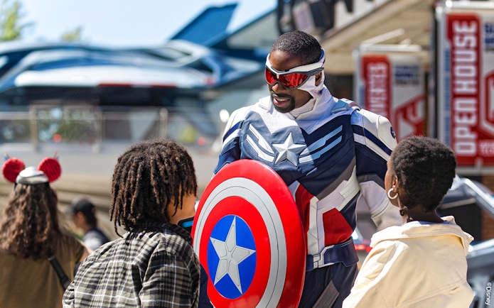 Character interaction at Disneyland Paris with children.