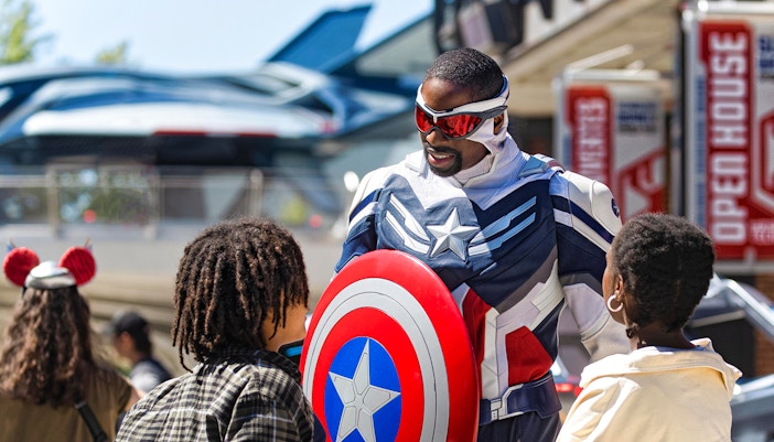 Character interaction at Disneyland Paris with children.