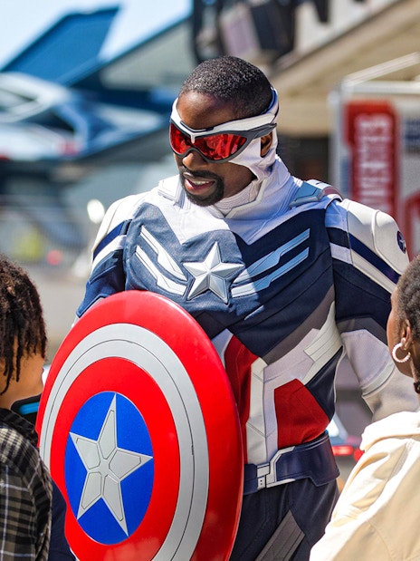 Character interaction at Disneyland Paris with children.