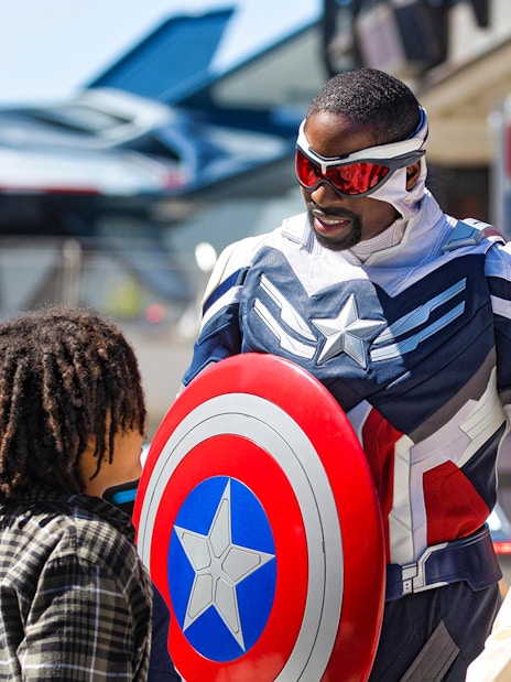 Character interaction at Disneyland Paris with children.