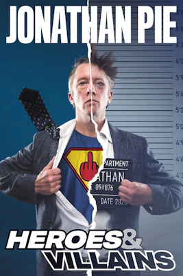 Jonathan Pie performing Heroes and Villains show on stage with audience in London theater.