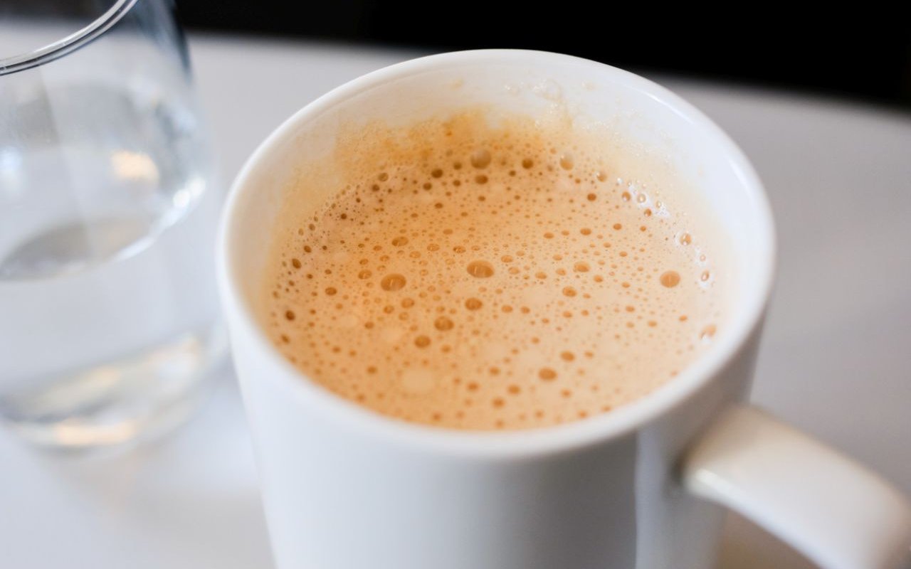 Creamy coffee served at Plaza Premium First Lounge, Rome Fiumicino Airport Terminal 1.