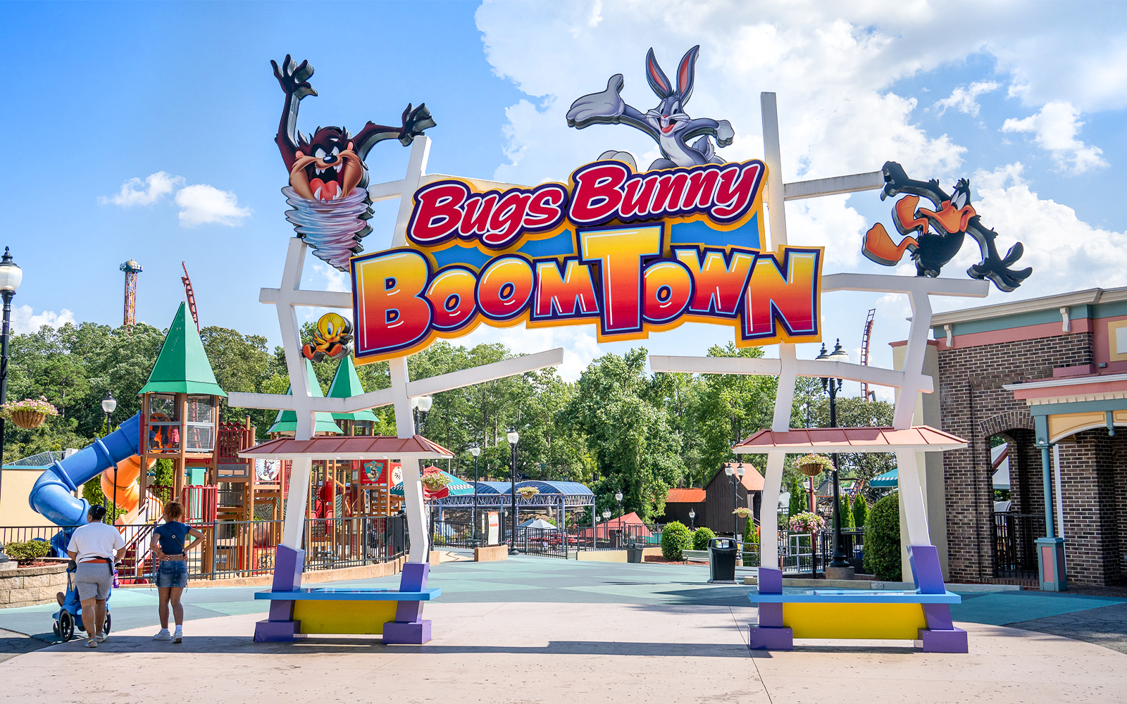 Bugs Bunny BoomTown entrance at Six Flags Over Georgia with colorful play structures.